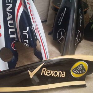 Lotus E20 F1 engine cover from the Sports Car Racing Gifts store collection.